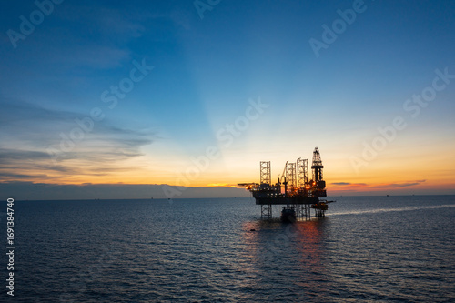Wallpaper Mural Aerial view of offshore jack up rig in a shipyard during sunset for oil and gas exploration and production.  Torontodigital.ca