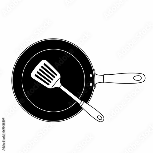 A simple black and white graphic illustration of a frying pan and spatula from a top-down view.