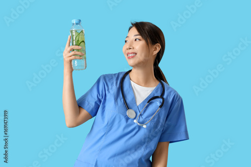 Female Asian doctor with bo...