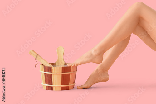 Legs of woman with water bu...