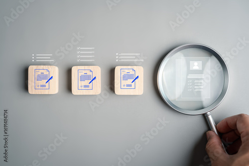 Resume screening, job application review, hiring process, and candidate selection concept with magnifying glass analyzing document recruitment and evaluation.