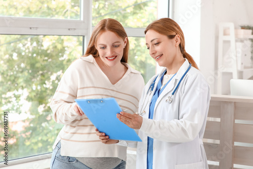 Female doctor working with ...