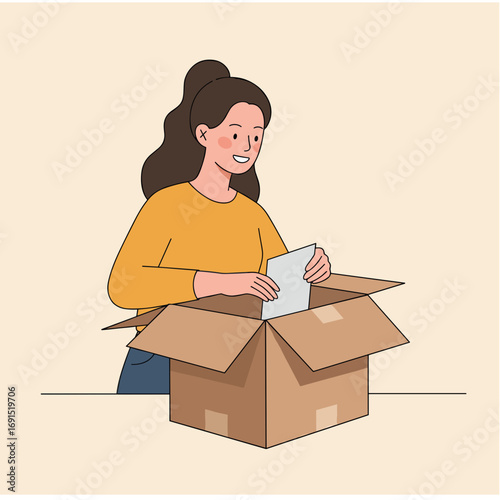 Young woman smiling while unboxing a package at home for Halloween  