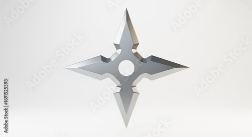 Close-up of a Metallic Shuriken, a Traditional Japanese Concealed Weapon, Isolated on White