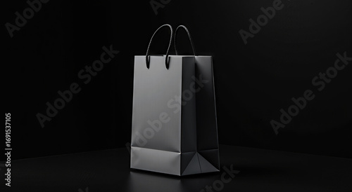 black shopping paper gift bag in a dark minimalistic 3d scene bag