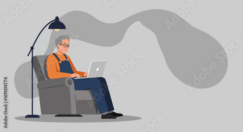 Content senior man uses a laptop in a comfortable armchair under a lamp, showcasing digital literacy and modern retired life at home.