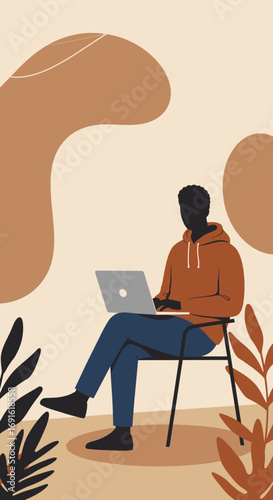 African American man using a laptop in a casual setting, depicting remote work, online learning, or digital lifestyle with modern comfort.