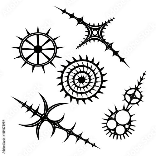 Collection of abstract black tribal tattoo designs featuring sharp geometric shapes and spiky elements arranged on a white background