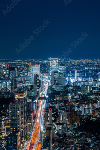 Photography Night cityscape of Tokyo Shinjuku area with high rise buildings at night
