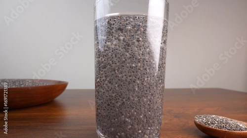 Chia seeds in water closeup. Healthy drink.