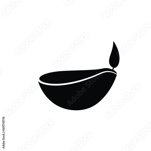 Black clay diya with flame lamp light