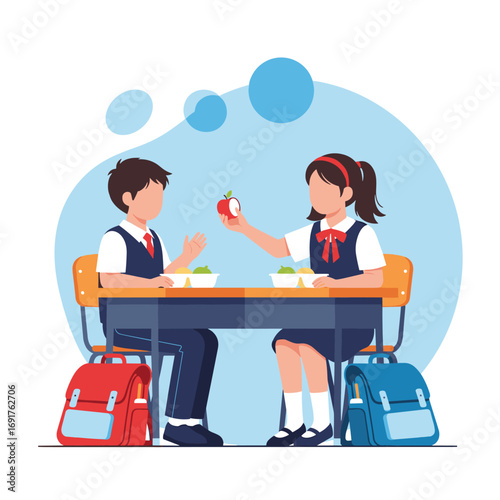Two young students in uniform share a healthy lunch together at a school desk with backpacks by their sides
