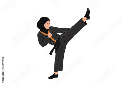 Empowered Muslim Woman in Hijab Executes a Dynamic Martial Arts Kick.