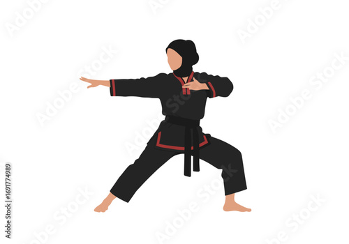 Focused Muslim Woman Practicing Martial Arts.