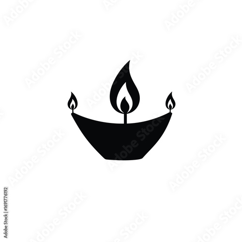Black silhouette of three flame lamps fire light