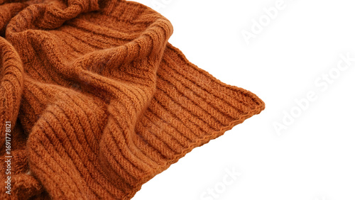 Closeup of cozy brown knitted wool blanket with ribbed texture on the transparent background for autumn and winter comfort