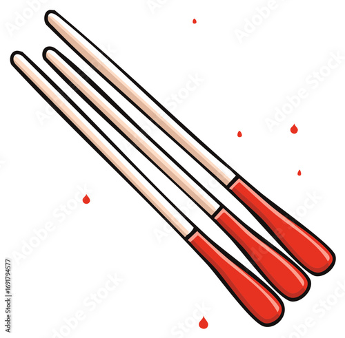 Three red tipped wooden chopsticks artfully arranged with scattered red droplets