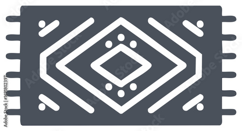 Dark gray textile with white geometric diamond pattern and fringed edges