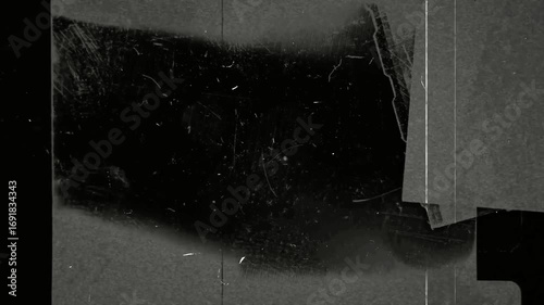 The dirty film transition overlay in black background.