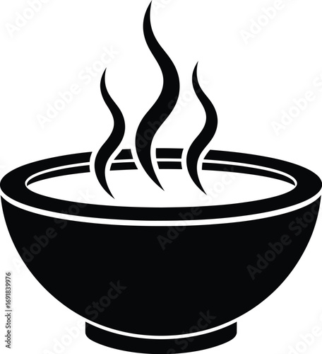 Bowl of soup with steam a comforting and warm dish, perfect for a chilly day, offering nourishment and satisfaction
