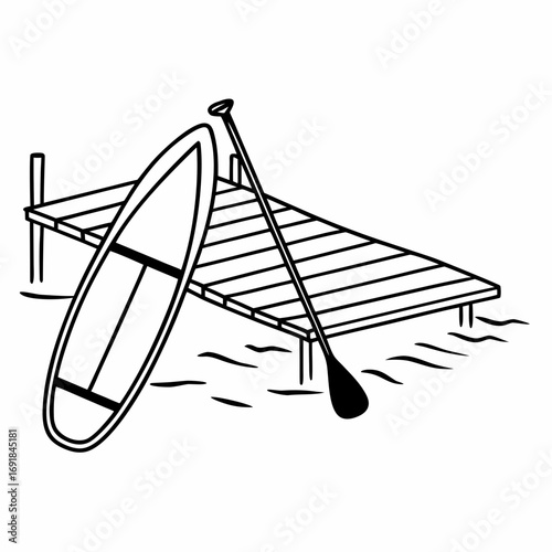 Paddleboard and paddle leaning against wooden dock on water pier