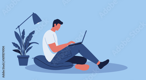 A man comfortably works on his laptop, sitting on a cushion at home. Ideal for remote work, freelance, online learning, or modern lifestyle themes illustrating productivity and digital connection.