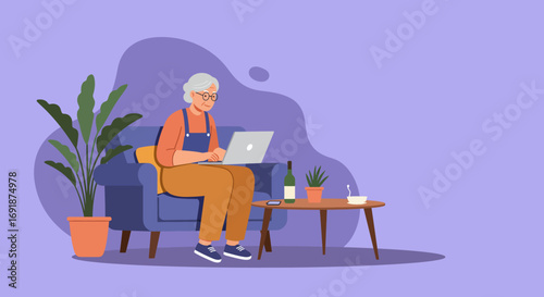 Elderly woman comfortably uses a laptop at home, embracing technology for communication, learning, or leisure. Represents active senior lifestyle.