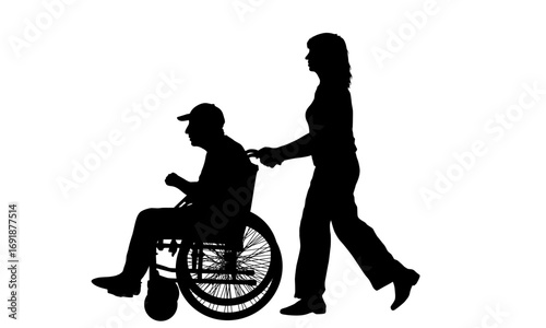 Silhouette of a woman pushing a man in a wheelchair.