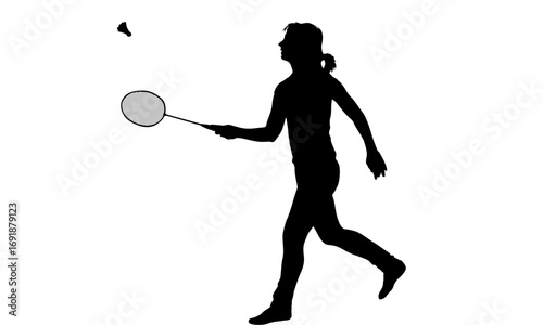 Silhouette of a woman playing badminton, racket in hand, shuttlecock in air.