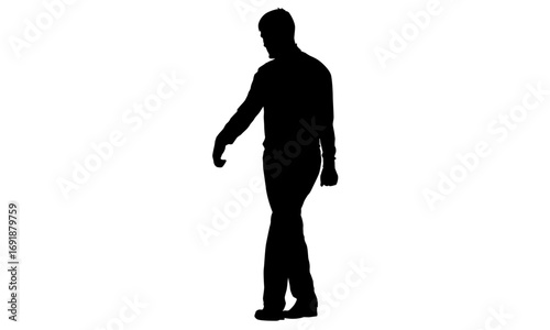 Silhouette of a man walking, full body shot.