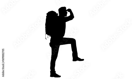 Silhouette of a hiker with a large backpack, raising a hand to their brow to look out into the distance.