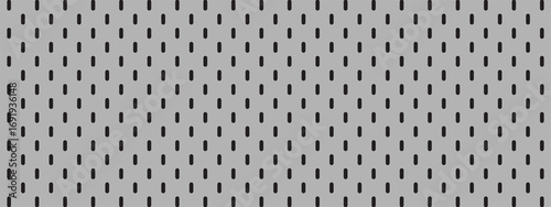 Gray Metallic Pegboard Background with Horizontal Black Slots in a Repetitive Pattern.