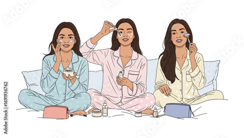 Three young women in pajamas applying makeup and skincare products during a fun slumber party or beauty routine together