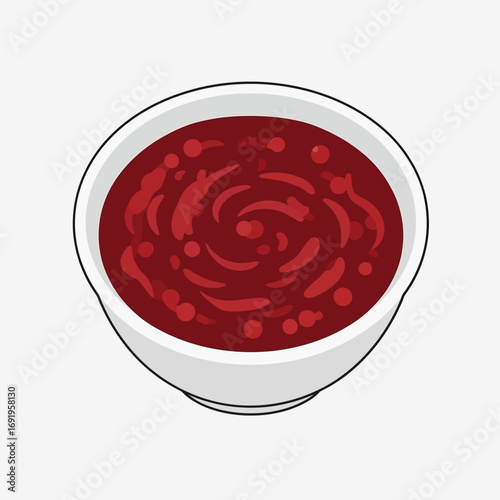 Top-down view of a bowl filled with a dark red, textured sauce.