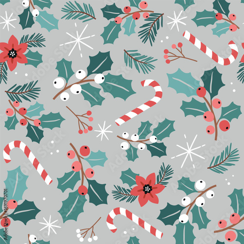 Seamless vector pattern with Christmas foliage, candy cane and poinsettia. Hand drawn winter ornament. Perfect for textile, wallpaper or nursery print design. EPS10 vector file.