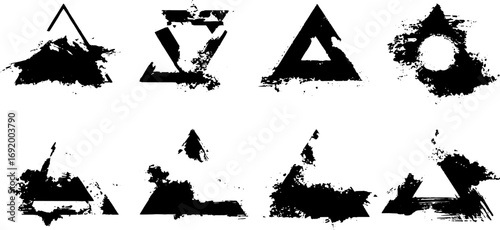 Grunge triangle shapes set in black ink. Abstract geometric set in brush texture vector illustration.