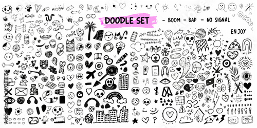 Large collection of hand drawn black and white doodle icons and symbols for creative design
