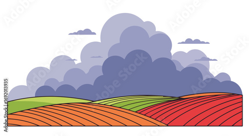 Colorful patterned fields with large clouds above
