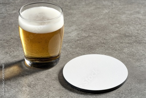 Two round coasters concrete surface are white color beer coaster
