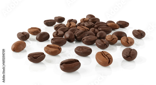 Roasted coffee beans scattered on a white surface, displaying various shades and textures.