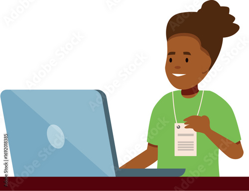 Participant wearing an identification badge attending a professional event and using a laptop computer