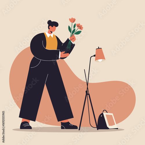 Stylish person arranging a fresh flower bouquet, preparing for home decor, a special occasion, or a creative project. Modern lifestyle and botanical hobby.