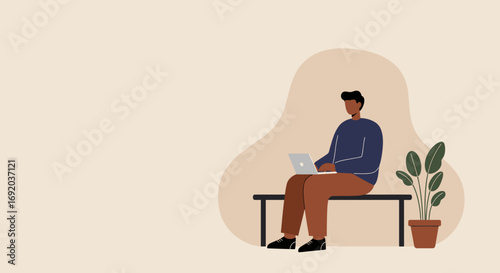 Young man working remotely on a laptop, sitting on a bench next to a houseplant. Ideal for concepts of productivity, digital nomad, or flexible work lifestyle.