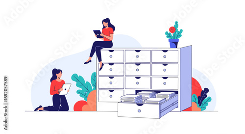 Women efficiently managing data and information with digital devices near filing cabinets