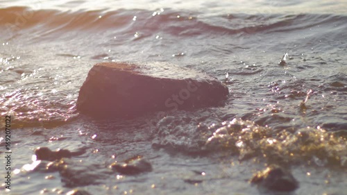 Peaceful River Sunset with Waves Crashing on Rock, Footage in Ultra HD 4K