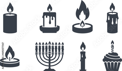 Collection of various lit candles and a menorah representing light and celebration
