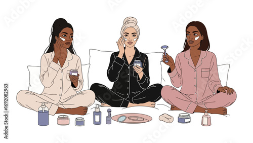 Three diverse young women in pajamas enjoying a relaxing skincare routine together at home applying facial masks and creams