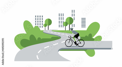 Cyclist with helmet riding a black bicycle on a winding road.