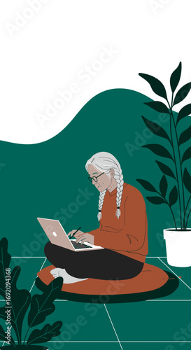 Focused senior woman with glasses and braided hair, sitting comfortably with a laptop at home. Represents modern elders embracing technology for work or learning.
