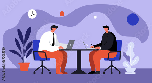 Two professionals collaborating on laptops at a modern office table. Ideal for business meetings, teamwork, and digital productivity concepts.
